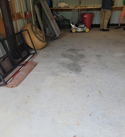 Cracked and Sunken Concrete Garage Floor Permanently Repaired in Mayville, WI - Before Photo