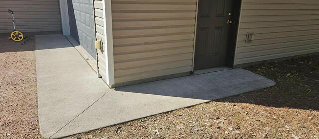 Concrete Protected, Leveled & Sealed in Conover, WI - Before Photo