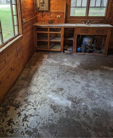 Concrete Slab Under Log Cabin Lifted and Leveled in Cedar River, MI - After Photo