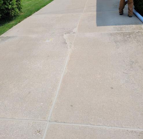 Cracked, Sloping Concrete Driveway Causing Foundation Water Issues Fixed in Mount Calvary, WI - After Photo