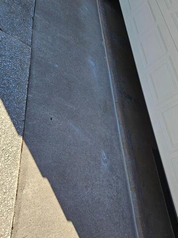 Sinking Driveway & Garage Apron Lifted and Joints Sealed in Whitelaw, WI - After Photo