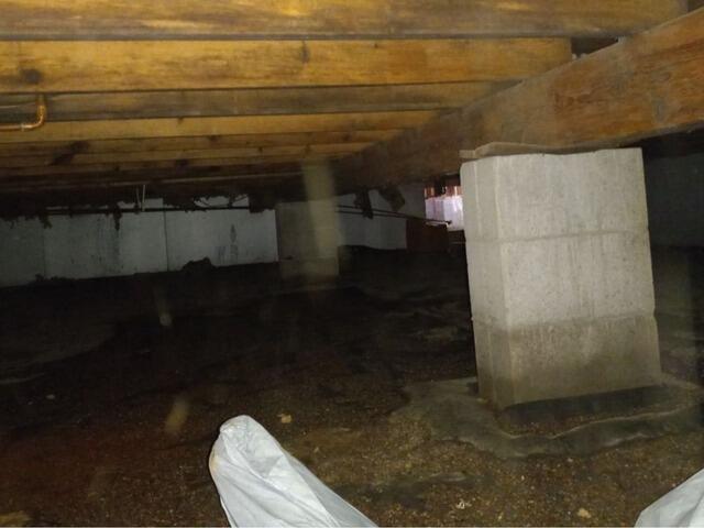 Damp Crawlspace gets Encapsulation, Insulation & Water Control in Woodruff, WI - Before Photo