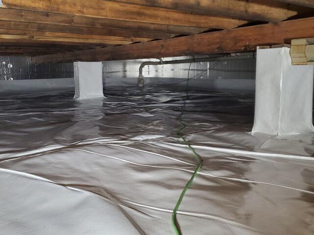 Damp Crawlspace gets Encapsulation, Insulation & Water Control in Woodruff, WI - After Photo