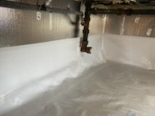 Crawl Space Vapor Barrier Installation & Floor Joist Repair in Florence, WI - After Photo