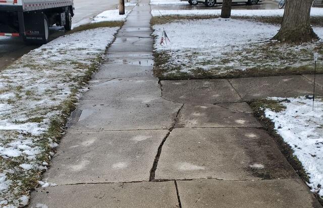 Cracked and Sunken Concrete Driveway Repaired in Lomira, WI - After Photo