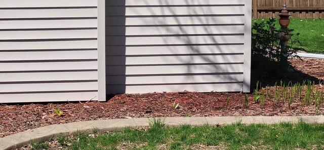 Sagging Foundation Lifted & Stabilized with Piering System in Appleton, WI - Before Photo