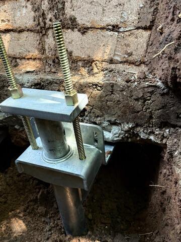 Sagging Foundation Lifted & Stabilized with Piering System in Appleton, WI - After Photo