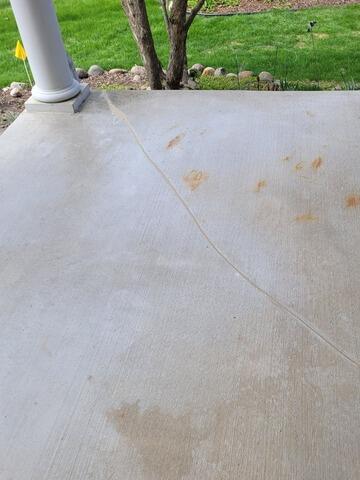 Cracked, Sunken Concrete Lifted, Leveled & Sealed with PolyLevel Foam & NexusPro Joint Sealant in Sheboygan, WI - After Photo
