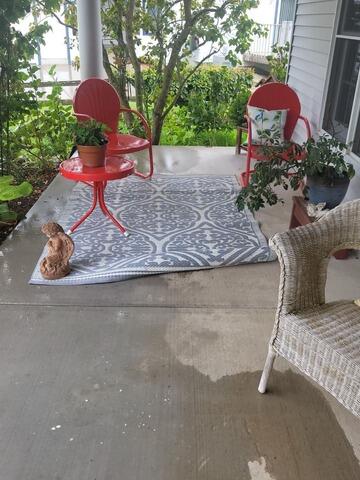 Cracked, Sunken Concrete Lifted, Leveled & Sealed with PolyLevel Foam & NexusPro Joint Sealant in Sheboygan, WI - Before Photo