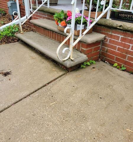 Concrete Sidewalk and Front Stoop Repair in Green Bay, Wi - Before Photo