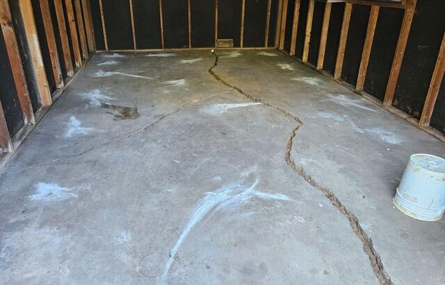Severely Cracked and Uneven Concrete Garage Floor Repaired and Sealed in Menasha, WI - After Photo