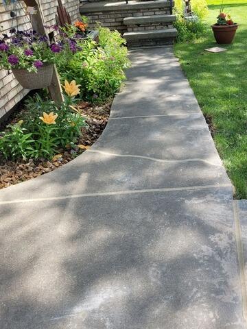 Cracked Concrete Sidewalk Needs Concrete Leveling in Kaukauna, WI - After Photo