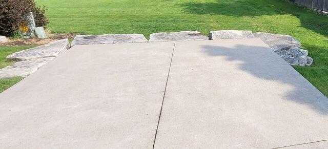 Concrete Driveway Repaired in Oshkosh, WI - Before Photo