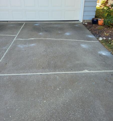 Cracked and Sunken Concrete Driveway Repaired in Oshkosh, WI - After Photo