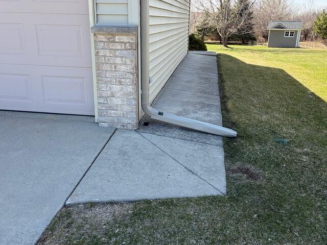 Concrete Walkway Repair in Fond Du Lac, WI - Before Photo