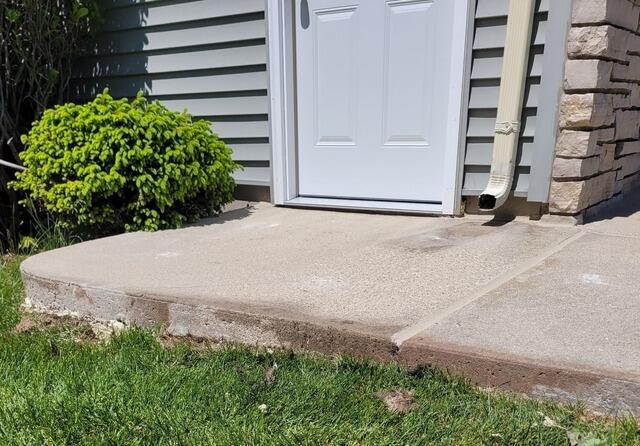 Failing Concrete Driveway Lifted and Leveled in Fond Du Lac, WI - After Photo