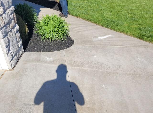 Concrete Driveway and Walkway Lifted and Repaired in Hortonville, WI - After Photo
