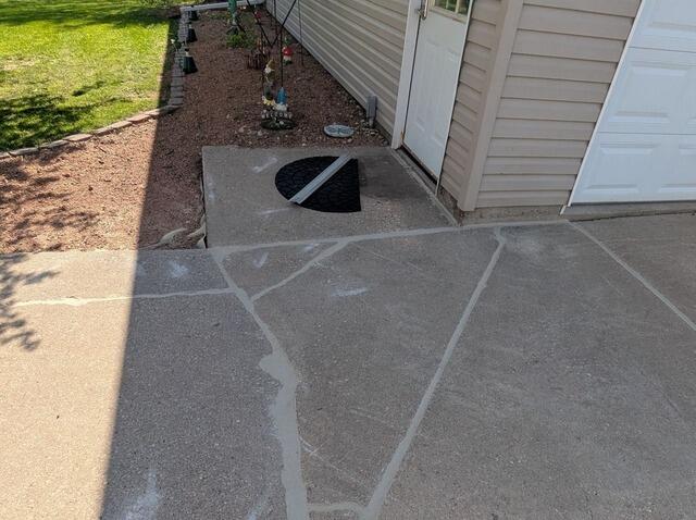 Concrete Driveway and Patio Repaired in Clintonville, WI - After Photo
