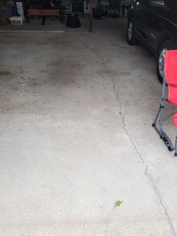 Cracked Garage Floor Repaired in Malone, WI - Before Photo