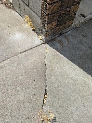Concrete Garage Apron Repair in Rhinelander, WI - Before Photo