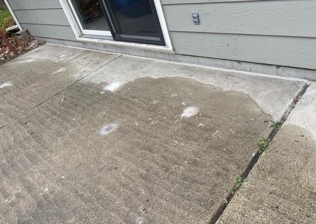 Sunken Concrete Patio Repaired in West Bend, WI - Before Photo