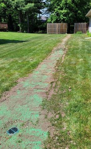 Basement Sump Pump Installation & Buried Yard Drainage in Kronenwetter, WI - After Photo