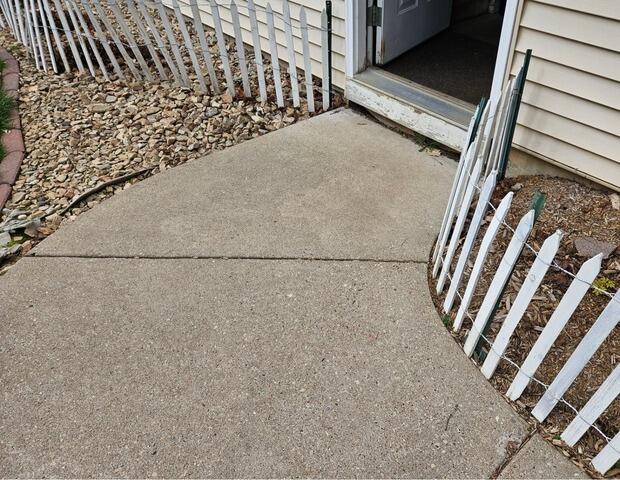 Sunken Concrete Driveway Repair in Marshfield, WI - Before Photo