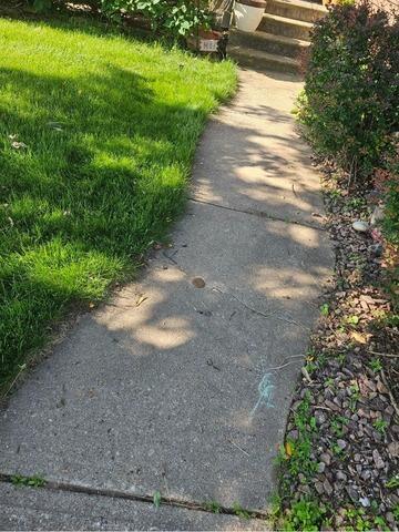 Concrete Driveway Repaired in Marshfield, WI - Before Photo