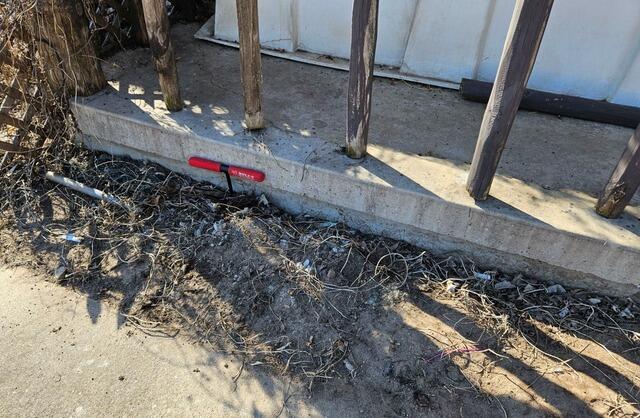 Concrete Driveway and Front Porch Lifted and Leveled in Plover, WI - Before Photo