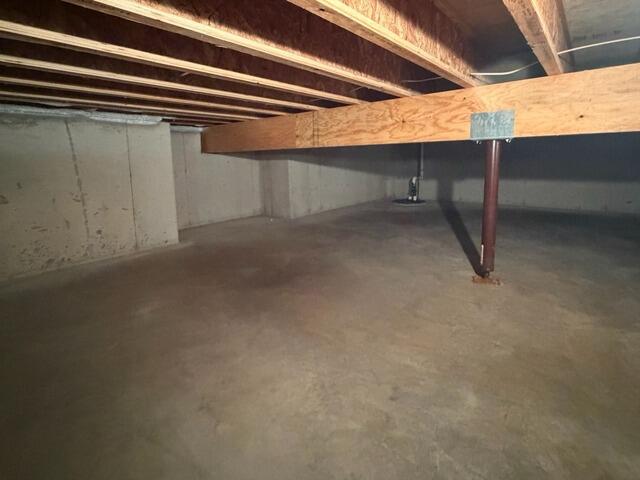 Wet Basement Waterproofing & Dehimidification in Baileys Harbor, WI - Before Photo