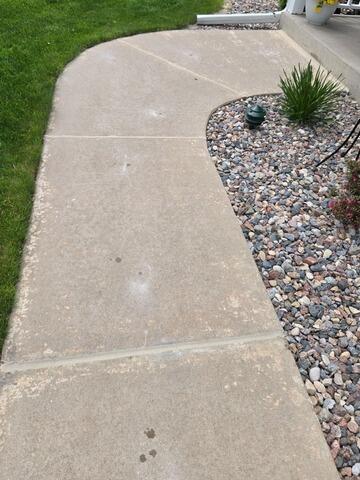 Cracked and Sunken Concrete Sidewalk Repaired in Antigo, WI - After Photo