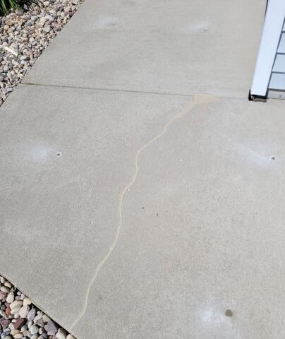 Cracked Concrete Driveway Repaired in Greenville, WI - After Photo
