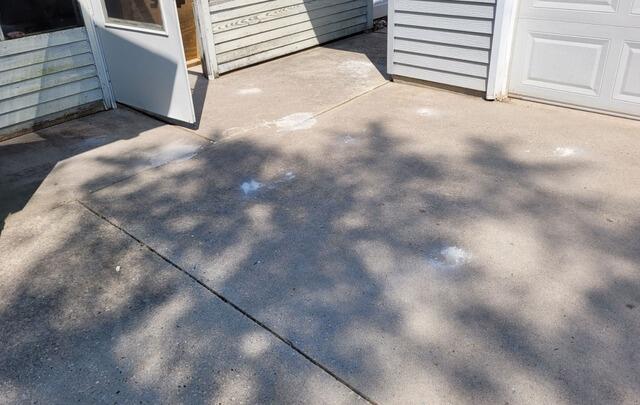 Cracked Concrete Driveway Repaired with PolyLevel Foam in Port Washington, WI - After Photo