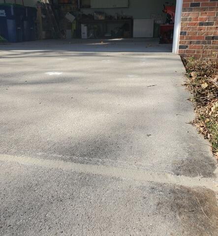 Sunken Cement Driveway Slabs Repaired in Port Washington, WI - After Photo