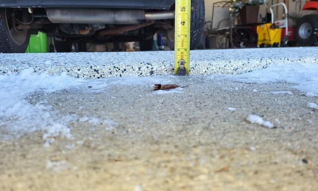 Sunken Concrete Driveway Repair in Waupun, WI - Before Photo