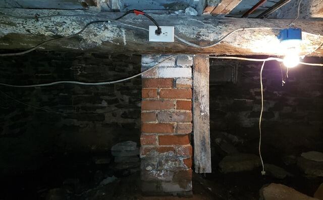 Wet Musty Crawl Space Encapsulated & Waterproofed in Suamico, WI - Before Photo