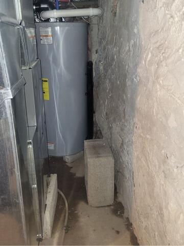 Wet Basement & Flooding Issues Solved in De Pere, WI - Before Photo