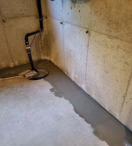 Basement Water Control & Interior Drainage System Installed in Oneida, WI - After Photo