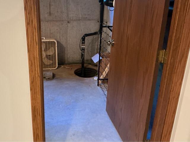 Basement Water Control & Interior Drainage System Installed in Oneida, WI - Before Photo
