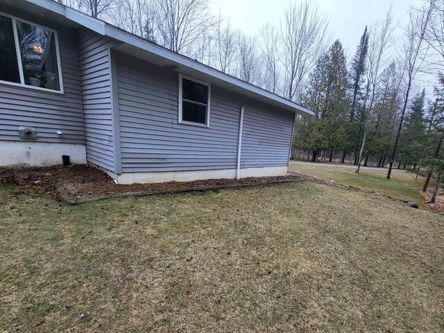 Settling Home Addition Repaired & Stabilized in Menominee, MI - Before Photo