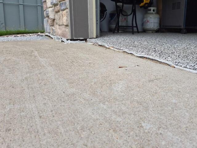 Cracked and Sunken Concrete Driveway Repaired in Shawano, WI