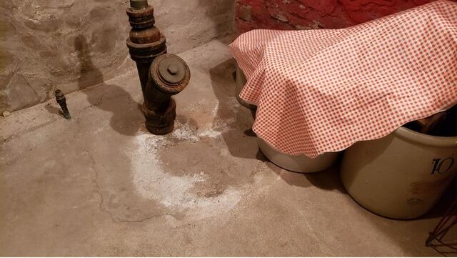 Wet Basement Repair with Sump Pump, Vapor Barrier & Drainage System Install in Ripon, WI - Before Photo