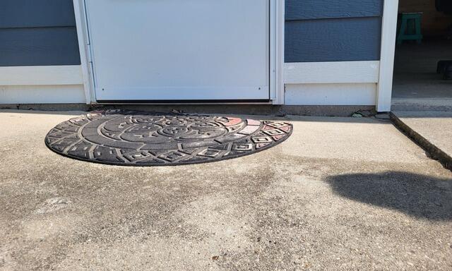 Concrete Driveway Leveled & Sealed in Kimberly, WI - Before Photo