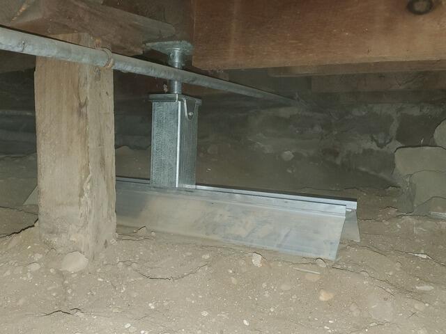 Sloping, Bouncy Floors Repaired & Stabilized with Joist Support System in Waupaca, WI - After Photo