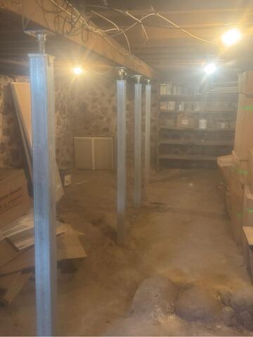 Sloping Floors in Home with Fieldstone Foundation Repaired & Stabilized in Waupaca, WI - After Photo