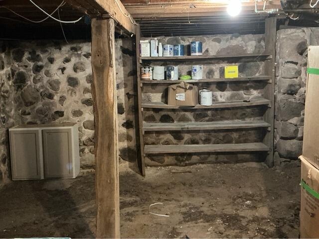 Sloping Floors in Home with Fieldstone Foundation Repaired & Stabilized in Waupaca, WI - Before Photo