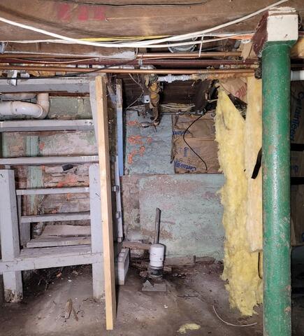 Sloping Floors & Sticking Door Issues Resolved with Joist Support Systen in Fond Du Lac, WI - Before Photo