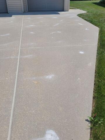 Sunken Concrete Driveway Leveling, Repair & Sealing in Menasha, WI - After Photo
