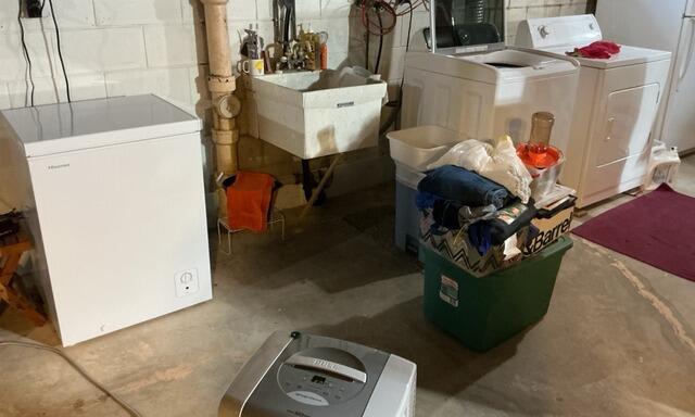 Wet Basement Repair & Sump Pump Installation in Sturgeon Bay, WI - Before Photo