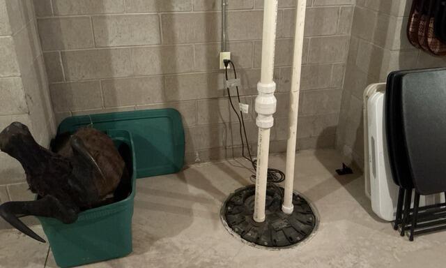 Interior Drainage System Resolves Basement Water Issues in Stevens Point, WI - Before Photo